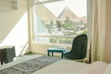 Turquoise Pyramids & Grand Egyptian Museum View - Cairo