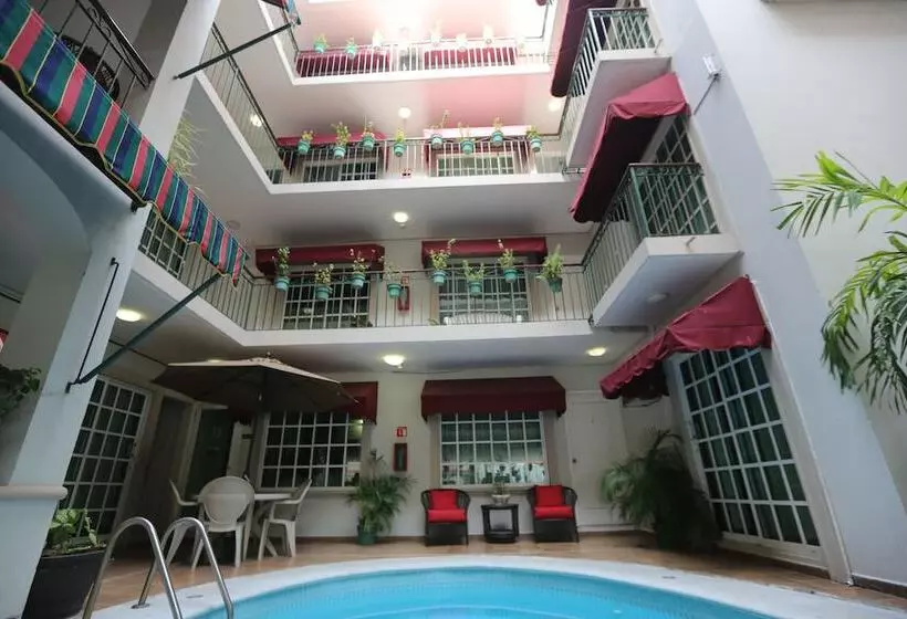 Capital O Boca Inn & Suites