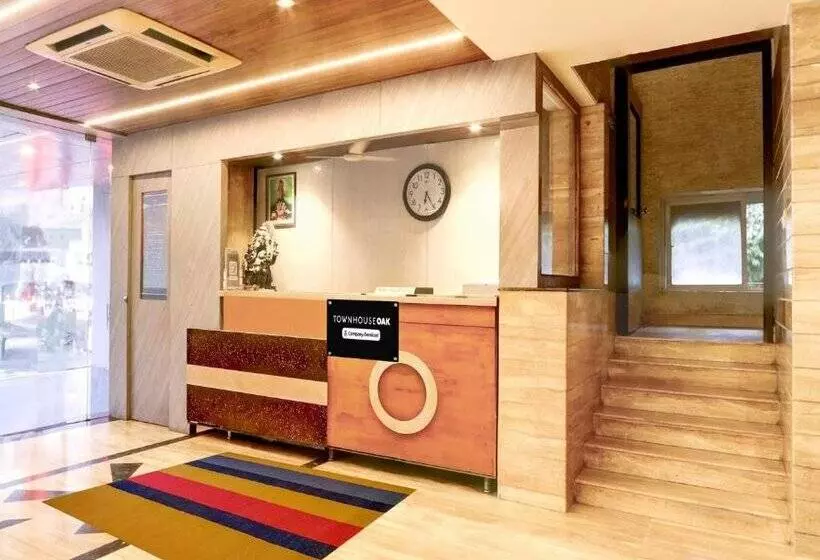 Fotos del hotel Capital O 918  Nera Regency:  14