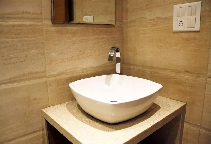 Fotos del hotel Capital O 419 A Suites:  12