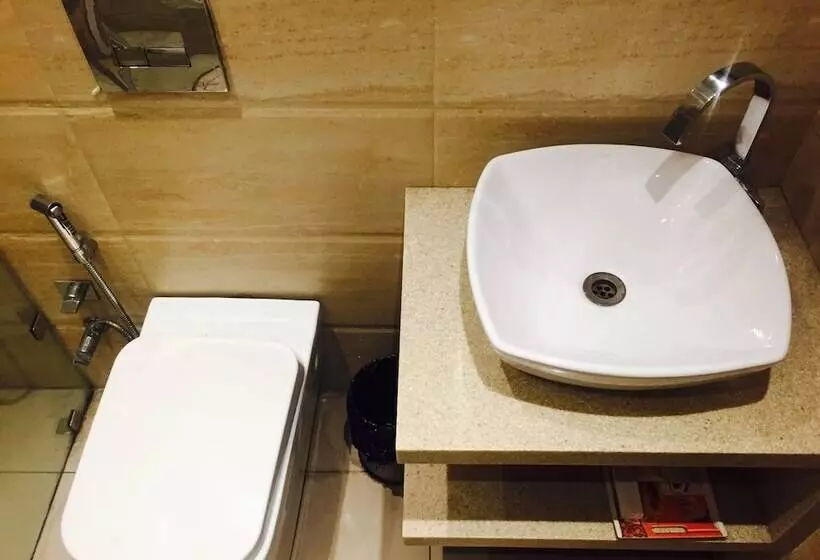 Fotos del hotel Capital O 419 A Suites:  9