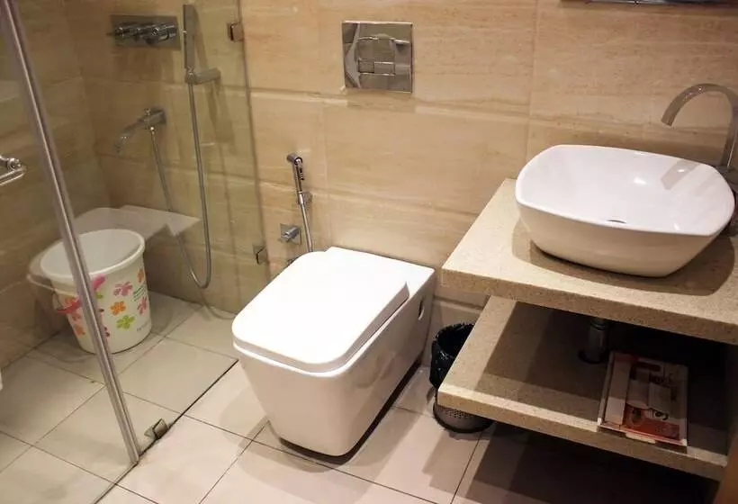 Fotos del hotel Capital O 419 A Suites:  5