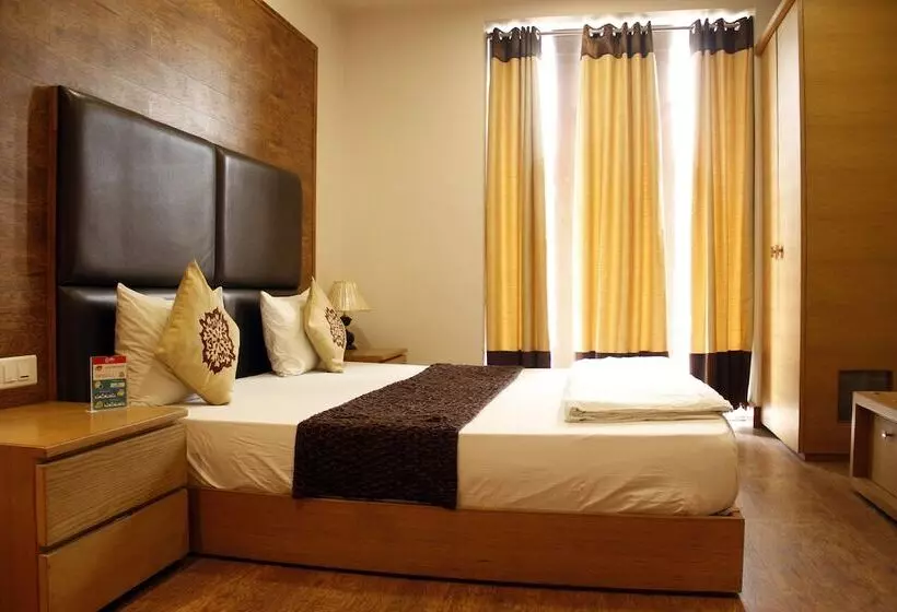 Fotos del hotel Capital O 419 A Suites:  21