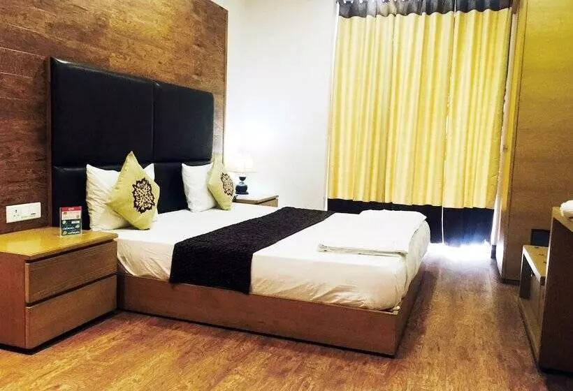 Fotos del hotel Capital O 419 A Suites:  19