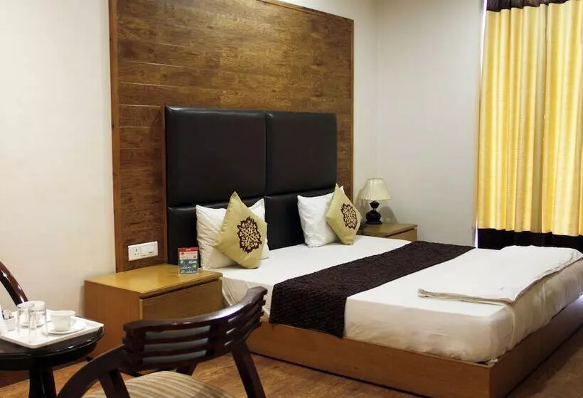 Fotos del hotel Capital O 419 A Suites:  13