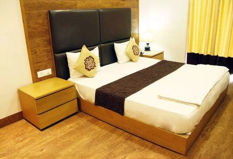 Fotos del hotel Capital O 419 A Suites:  6