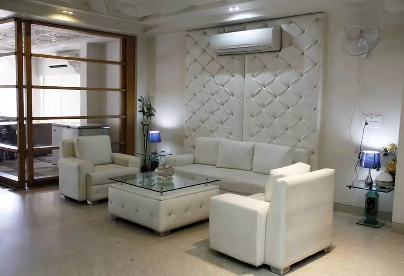 Fotos del hotel Capital O 419 A Suites:  24